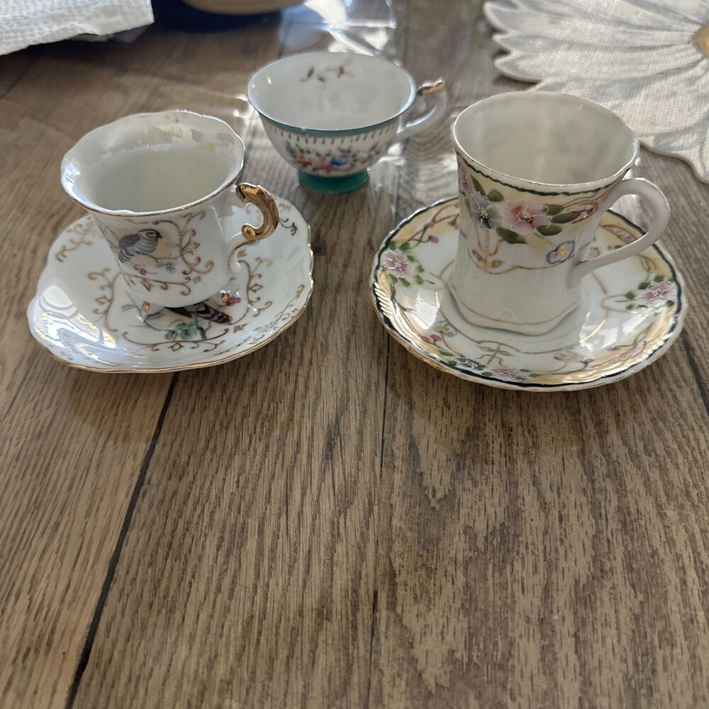 vintage modern tea cups and saucers set. 2 Sets And 1 Cup